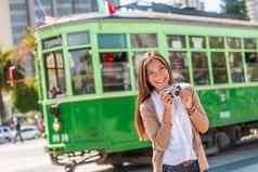 三旧金山电缆车缆车女人旅游采取图片受欢迎的吸引力古董有轨电车港亚洲女孩摄影师旅行加州美国旅行