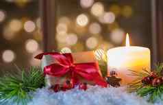 圣诞节假期背景礼物盒子燃烧蜡烛