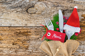 圣诞节表格的地方设置圣诞老人他菜单标签假期庆祝活动复制空间木背景