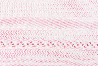 粉红色的用钩针编织纬纹理背景