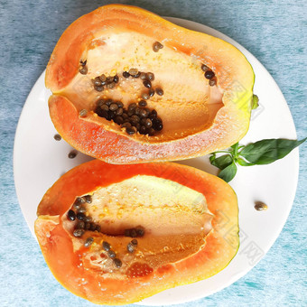 橙色颜色新鲜的木瓜减少一半白色背景丰富的纤维维生素抗氧化剂提高免疫力好糖尿病患者眼睛