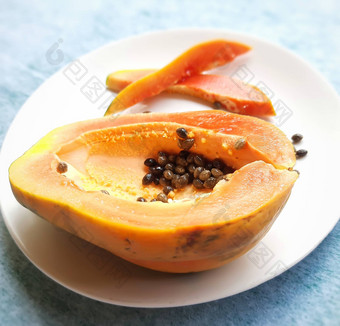 橙色颜色新鲜的木瓜减少一半狗块白色背景丰富的纤维维生素抗氧化剂提高免疫力好糖尿病<strong>患者</strong>眼睛