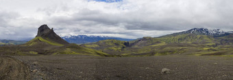 色彩斑斓的宽全景全景视图火山景观自然储备山背中央冰岛山独 角 兽绿色莫斯蓝色的雪覆盖山范围喜怒无常的天空