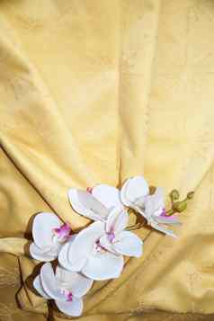 白色兰花花黄金纺织布料