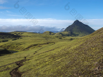 火山景观小径洛加长途跋涉绿色storasula山郁郁葱葱的莫斯低云山背自然储备冰岛蓝色的天空背景复制空间