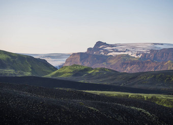 日出机器人营地<strong>冰岛</strong>洛加徒步旅行小道绿色谷火山景观视<strong>图片</strong>冰川早期早....粉红色的光