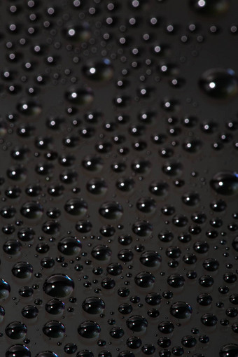 小水滴黑色的表面手机hydriphobic涂层玻璃屏幕