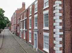 街优雅的大砖世纪房子切斯特英格兰鹅卵石人行道上路