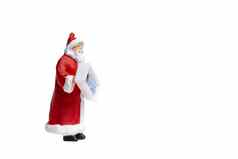 微型人圣诞老人老人持有礼物盒子孤立的白色背景剪裁路径