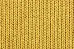 黄色的针织肋羊毛纺织背景纹理