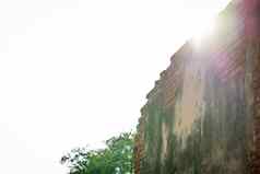 日落光照片古老的墙体系结构泰国