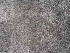 关闭温柔的灰色地毯纹理背景