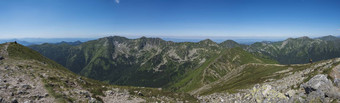 全景视图巴拉内克峰西方塔特拉山山rohace全景锋利的绿色山o罗哈克哭沃洛维茨徒步旅行小道脊夏天蓝色的天空白色云