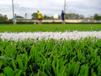 足球场阿斯特罗的地盘表面关闭扔踢角落里区域郁郁葱葱的绿色足球球场