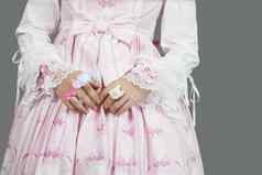 肖像日本cosplayer穿粉红色的衣服