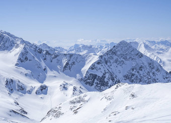 视图冬天景观前绍费尔斯皮茨山stubai格莱彻滑雪<strong>区域</strong>雪<strong>覆盖</strong>山峰春天阳光明媚的一天蓝色的天空背景入住提洛尔奥地利阿尔卑斯山脉