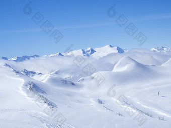 冬天景观雪覆盖山坡上蓝色的天空视图前kitzsteinhorn山kaprun滑雪度假胜地国家公园呵呵拖船奥地利阿尔卑斯山脉欧洲