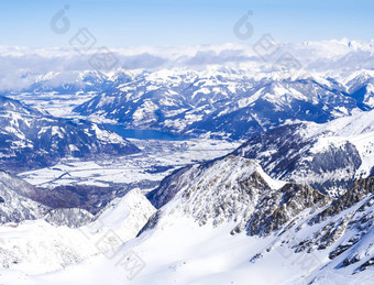 冬天景观雪覆盖山坡上蓝色的天空空中视图泽尔湖前kitzsteinhorn山kaprun滑雪度假胜地国家公园呵呵拖船奥地利阿尔卑斯山脉欧洲