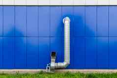 工业年级空气提取管电电动机蓝色的墙