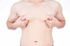 关闭男人。持有但乳房白色背景饮食重量损失苗条的身体健康的生活方式概念
