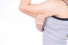 女人持有过度脂肪手臂孤立的白色背景女人捏手臂脂肪松弛皮肤重量损失苗条的身体健康的生活方式概念