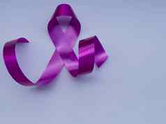 特写镜头粉红色的丝带乳房癌症意识一天运动象征