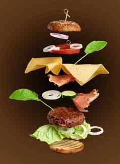 悬浮芝士汉堡成分多汁的肉肉片切达干酪