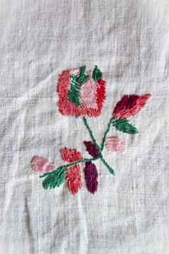 玫瑰手工制作的绣花光滑的装饰白色织物古董人刺绣白俄罗斯一半世纪