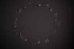 万圣节装饰概念黑色的纸蝙蝠黑色的纸板背景