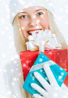 快乐圣诞节闪闪发光的雪背景快乐金发女郎女孩礼物盒子冬天季节购物出售假期品牌
