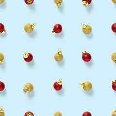 无缝的模式红色的黄金圣诞节装饰蓝色的背景背景使球圣诞节红色的饰品无缝的模式