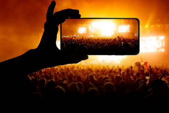 手智能手机记录生活音乐音乐会移动电话显示