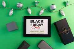 黑色的星期五出售概念礼物盒子照片框架绿色