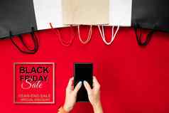 黑色的星期五出售女人手在线购物智能手机