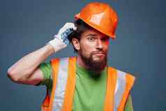 工人男人。建设统一的专业生活方式蓝色的背景