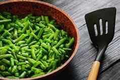 素食者食物炸字符串豆子锅时尚的背景设计极简主义健康的食物蔬菜