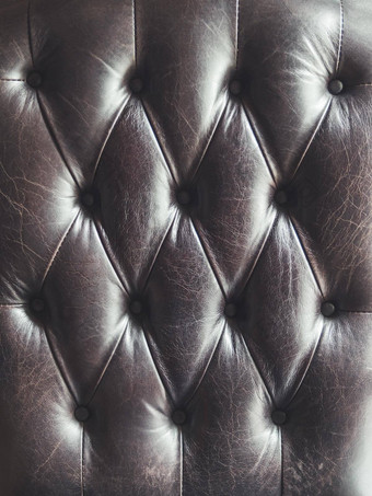 皮革沙发capitone<strong>切斯特菲尔德</strong>技术家具室内装潢黑暗优雅的家具阁楼织物背景自然变形背景