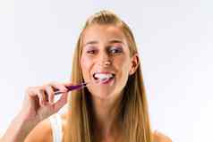 女人刷牙牙齿牙刷