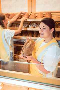 女售货员销售面包产品面包店商店