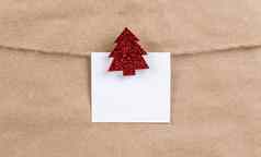 纸贴纸挂绳子木红色的闪闪发光的圣诞节树衣夹圣诞节装饰圣诞节卡