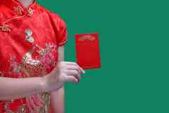 中国人女人持有一年红色的信封在香港堡文本呜