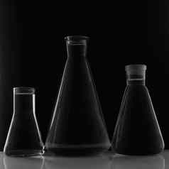 实验室设备玻璃瓶黑色的背景
