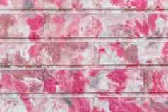 现代砖墙摘要白色粉红色的模式油漆纹理背景