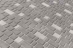 表面城市地板上纹理铺平道路石头马赛克瓷砖灰色的路板背景
