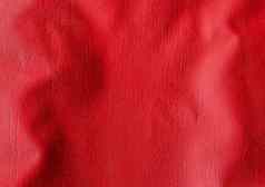 波浪纹理红色的人造皮革背景特写镜头