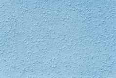 蓝色的摘要石膏模式墙纹理粉刷表面难看的东西背景
