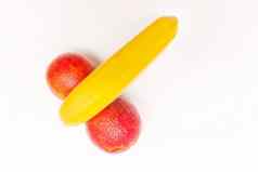 有趣的概念水果香蕉红色的橙子孤立的白色背景
