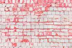 白色砖墙粉红色的油漆表面纹理背景