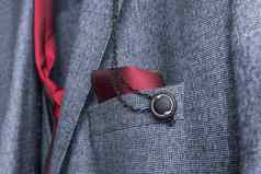 部分元素男人的西装领带装饰口袋里餐巾按钮特写镜头