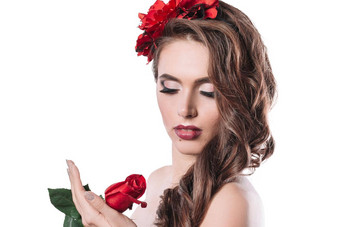 关闭肖像迷人的女人红色的玫瑰